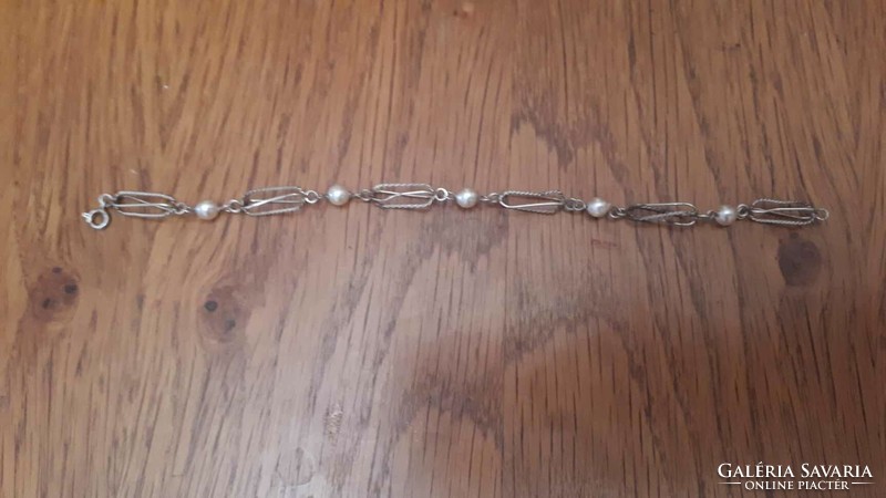 Antique silver bracelet with pearls, 21 cm long, in good condition for its age