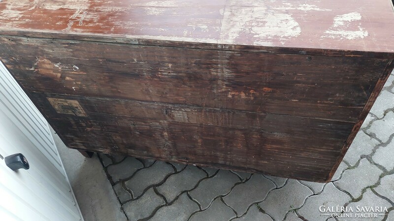 A 200-year-old chest of drawers with copper fittings