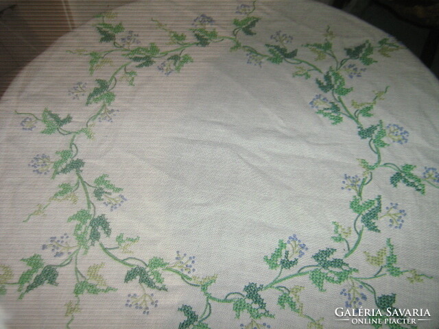 Beautiful hand-embroidered woven tablecloth with lacy edges