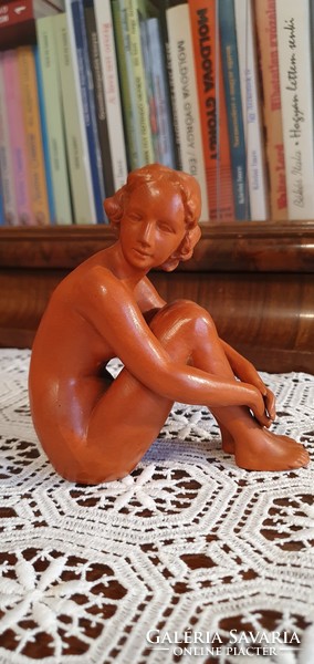 Mixed sculptures, including female nudes and starry-eyed children