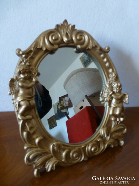 Wall or standing mirror with gilded putty, angelic