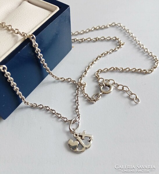 Women's silver chain with faith-hope-love pendant
