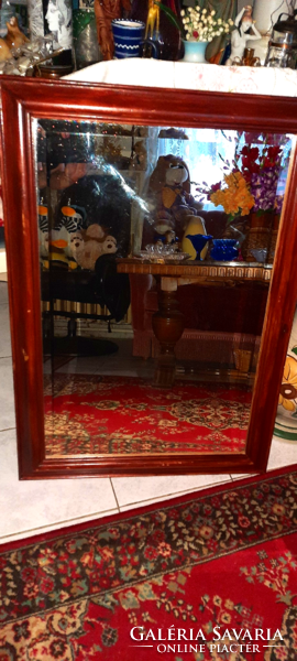 Old large wall mirror with faceted mirror