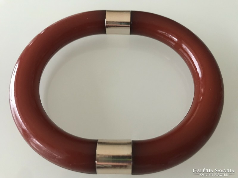Retro vinyl or plastic bracelet in rust brown color with gold-plated insert