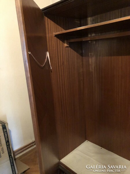 Large brown wooden wardrobe with 3 doors, made of very solid material, with shelves and hangers