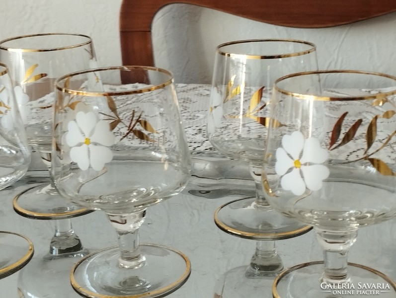 Set of retro gold-plated, floral cognac stemmed glass glasses.