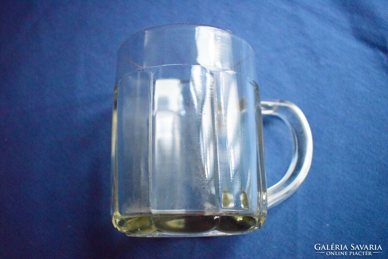 Old glass jug 0.5 liter, polished base, ribbed surface, interesting ear design
