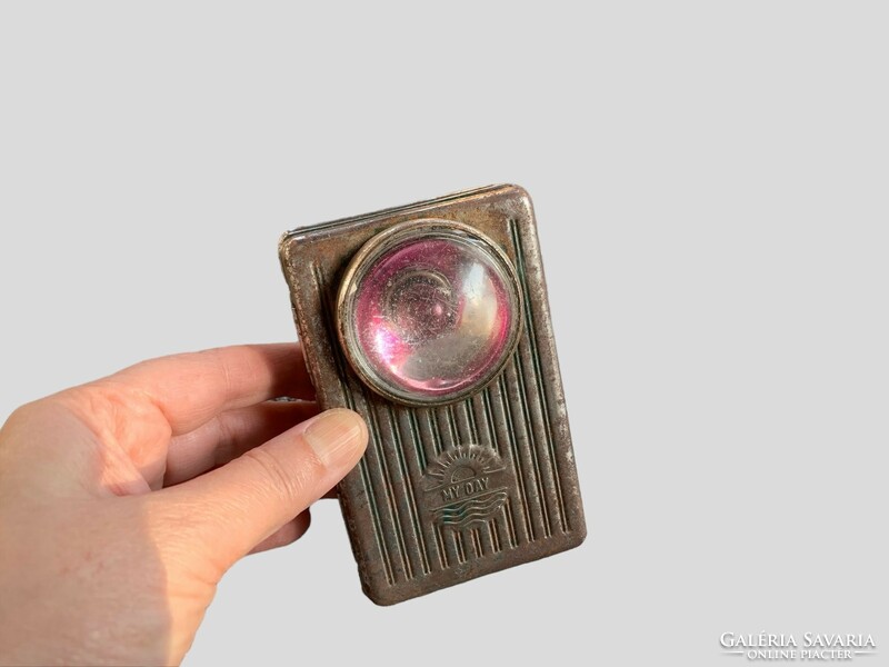 Old my day flashlight with pink bulb and convex magnifying lens