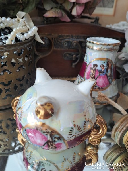 Luster-glazed porcelain oil lamp.
