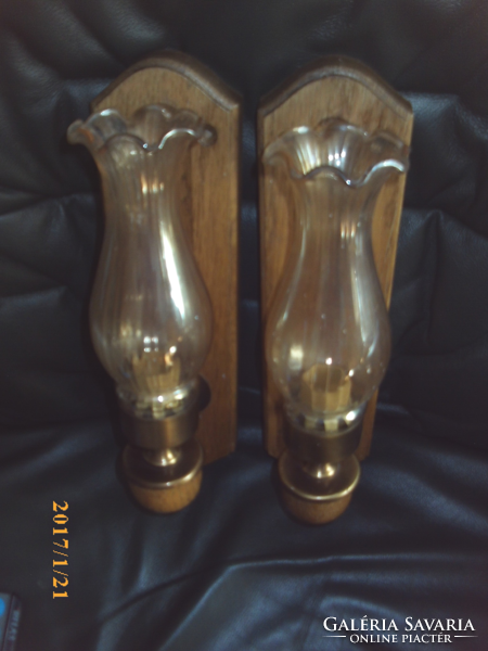 A pair of graceful romantic glass-encased wall arms
