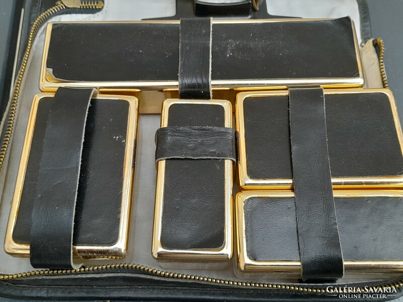 Old travel razor set in leather case