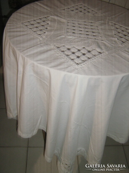 Beautiful white tablecloth with lace inserts