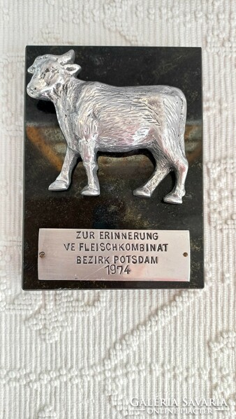 Memorial plaque, on a marble base with a plastic metal cattle figure, with engraved text