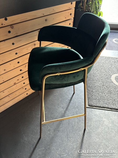 Bar stool with green velvet cover