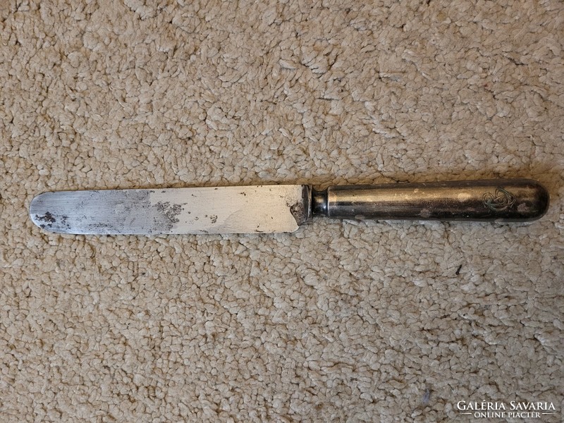 Old butter knife, butter knife with markings.