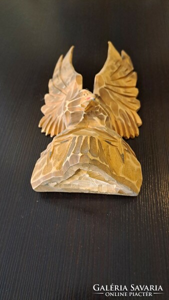 Carved bird statue