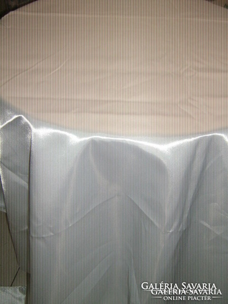 Beautiful elegant shiny white silk tablecloth
