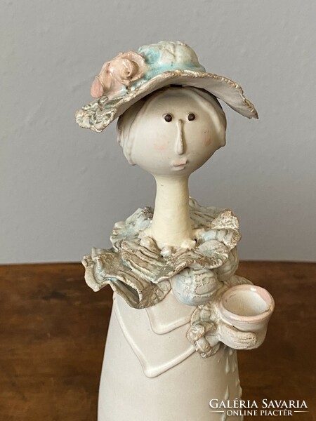 Lady with a hat marked Ze ceramic woman statue 23.5 Cm