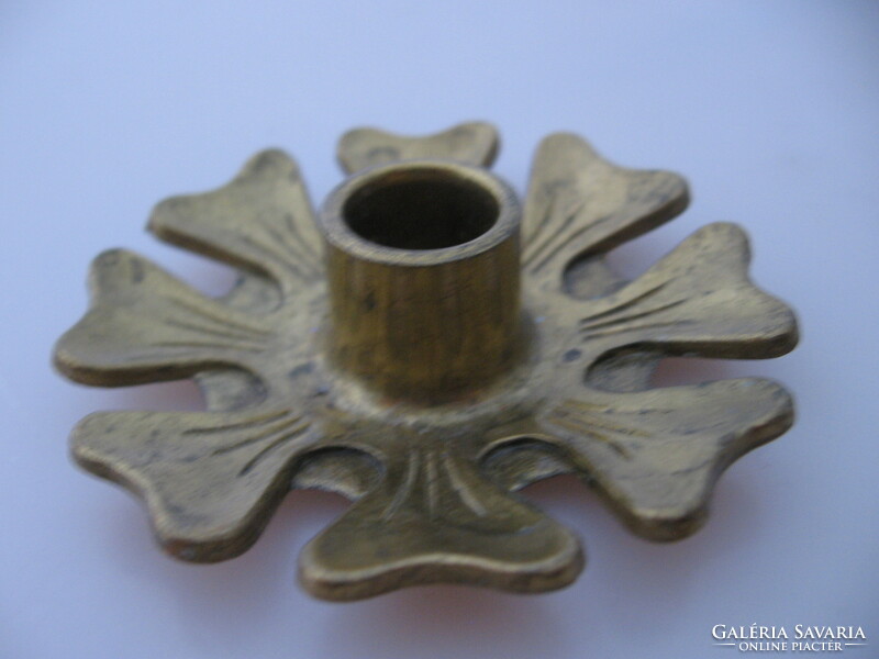 Flower, snowflake-shaped copper candle holder