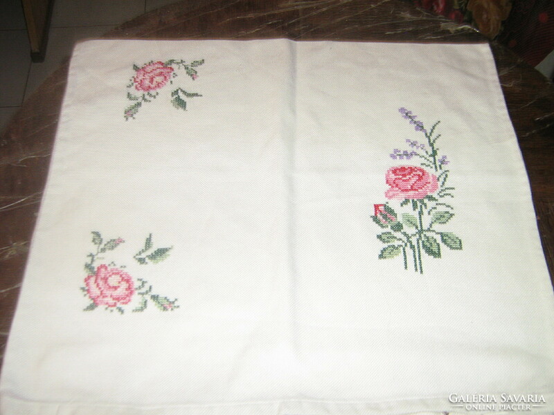 Rose decorative pillow made with beautiful cross-stitch embroidery