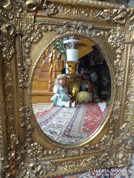 Csiszolt tükör,barokk keretben.