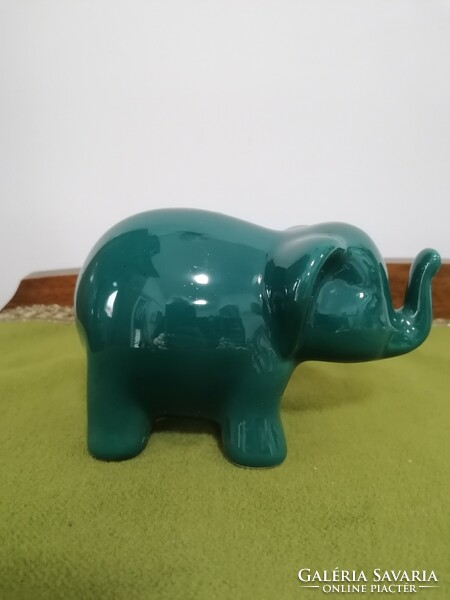 Retro ceramic turquoise elephant with an upright nose