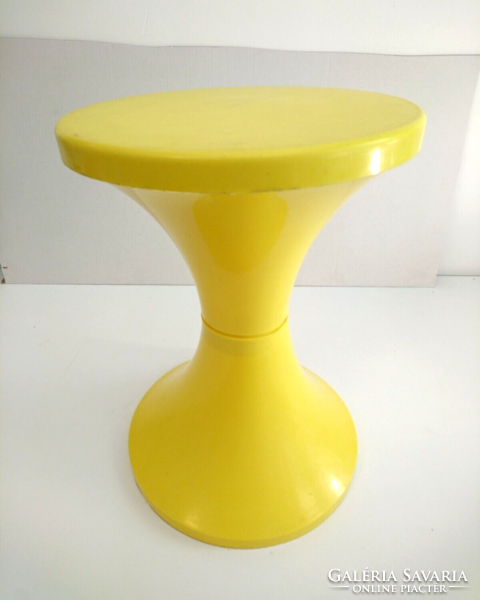 Original retro plastic pille chair in yellow color. Space age design 1970s