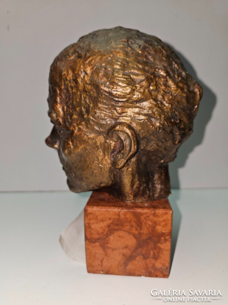 Bronze head on a marble base