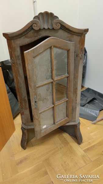 Wooden corner cabinet with glass