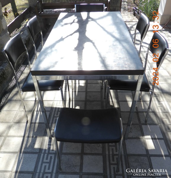Chrome metal dining table with chairs