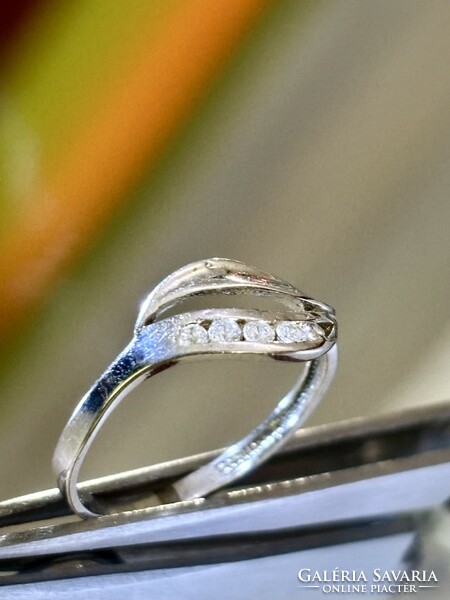 Shiny, graceful silver ring, embellished with white zirconia stones