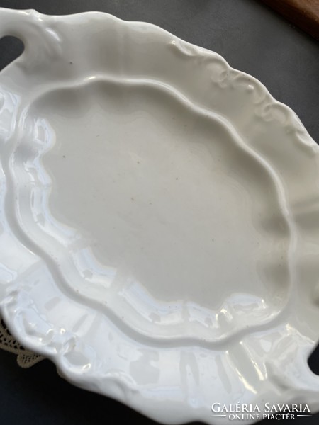 Old, large white porcelain serving bowl with handle, table centre
