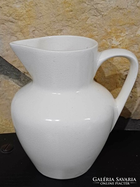Old earthenware jug-spout