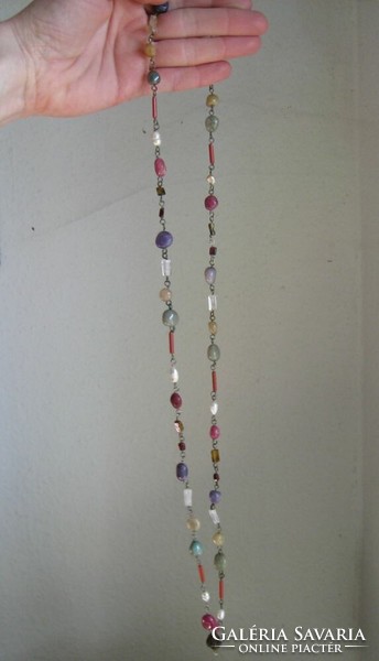 Long metal necklace with minerals and precious stones