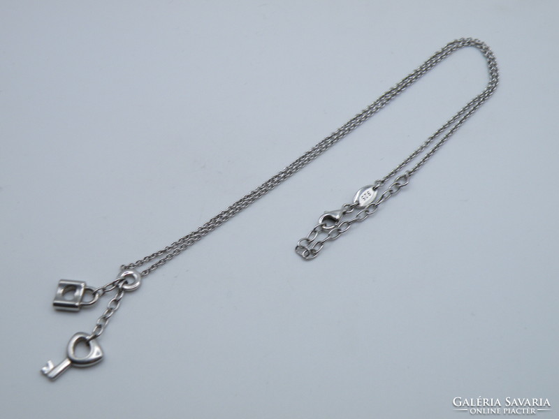 Uk0295 fossil silver necklace with key edge lock pendant 925