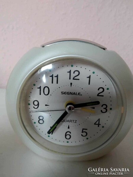 4 clocks in one, 1 travel clock and 3 alarm clocks