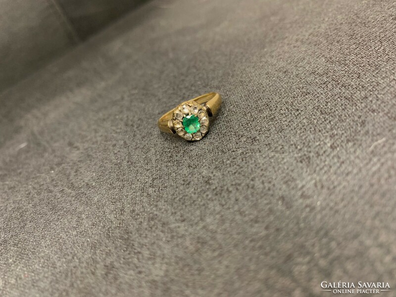 Antique gold emerald ring with diamonds