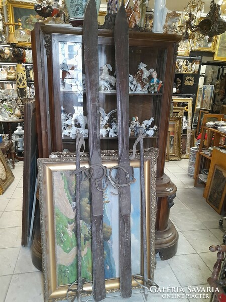Old wooden frame with authentic skis and ski poles. 190 Cm.