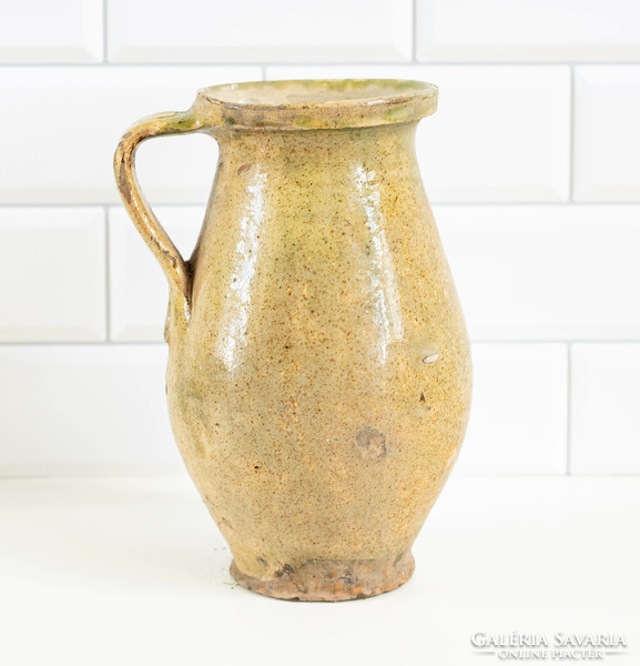 Old ceramic sherd with a greenish-yellow glaze - jug, jug, jug, folk art
