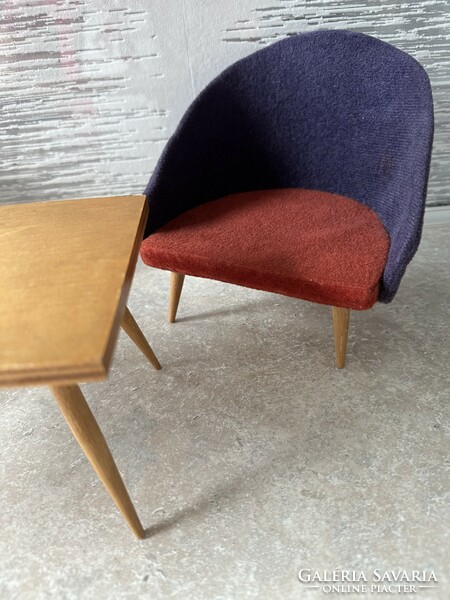 Miniature replica of a retro shell armchair from the 1960s