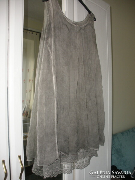 Silk, a dress or tunic containing silk