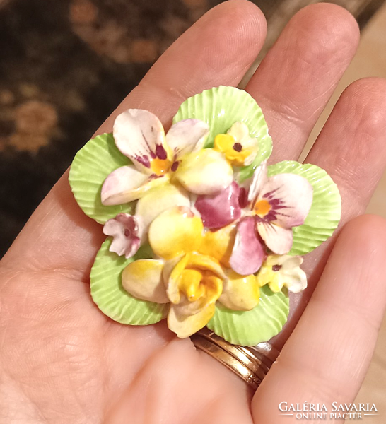 Beautiful porcelain brooch with violet and other floral patterns