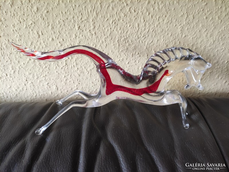 Colorful galloping glass horse. From the legacy of photographer G.