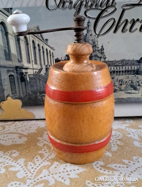 Old wooden manual pepper grinder