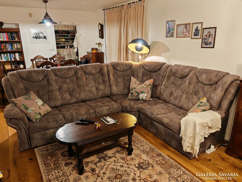 Upholstered with premium fabric, a new one-year-old openable corner sofa set in perfect condition