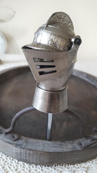 Bottle stopper in the shape of a knight's armored helmet, drink spout