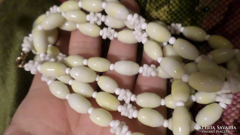 124 cm retro necklace made of butter yellow-white glass beads.