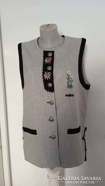 This traditional vest is in good condition