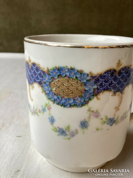Antique porcelain flower mug.