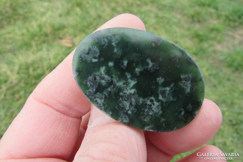 Uniquely handcrafted gem-quality serpentinite cabochon